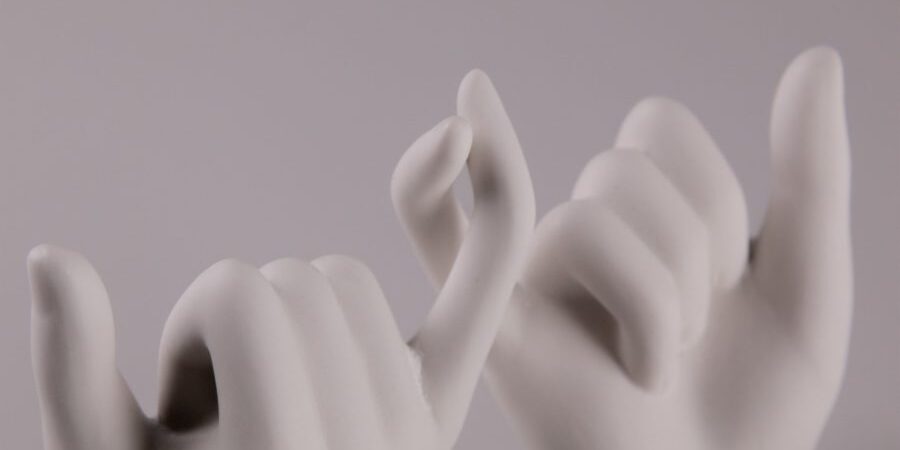 human hand forming heart shape