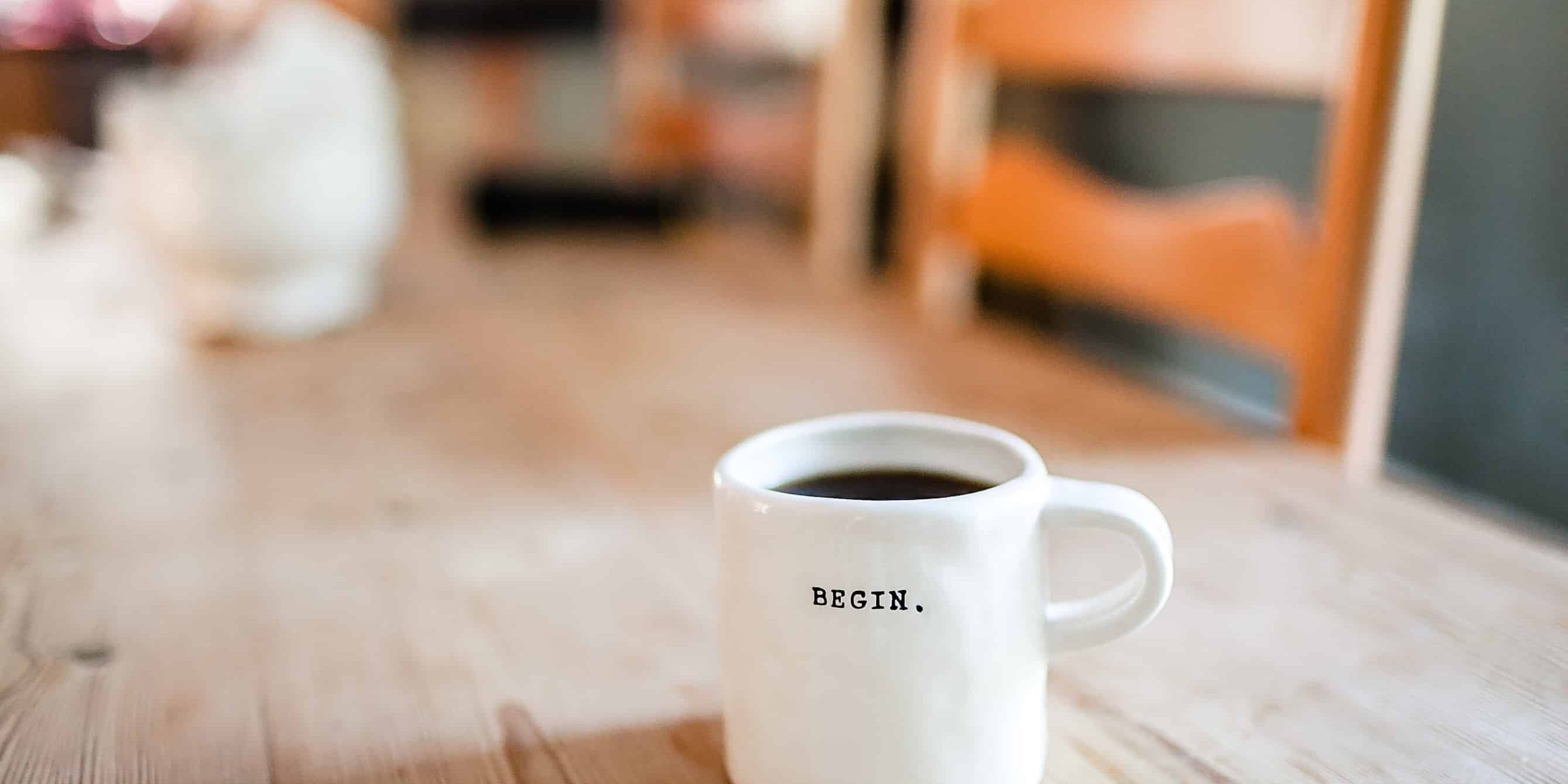 white ceramic mug on table