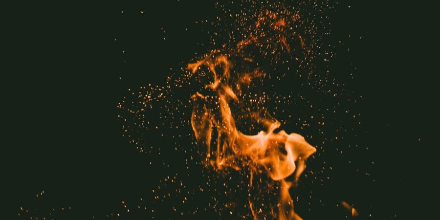 fire in the sky during night time