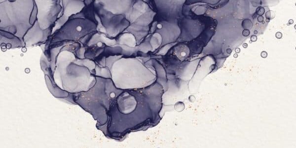 Alcohol ink with gold splatters on watercolor paper